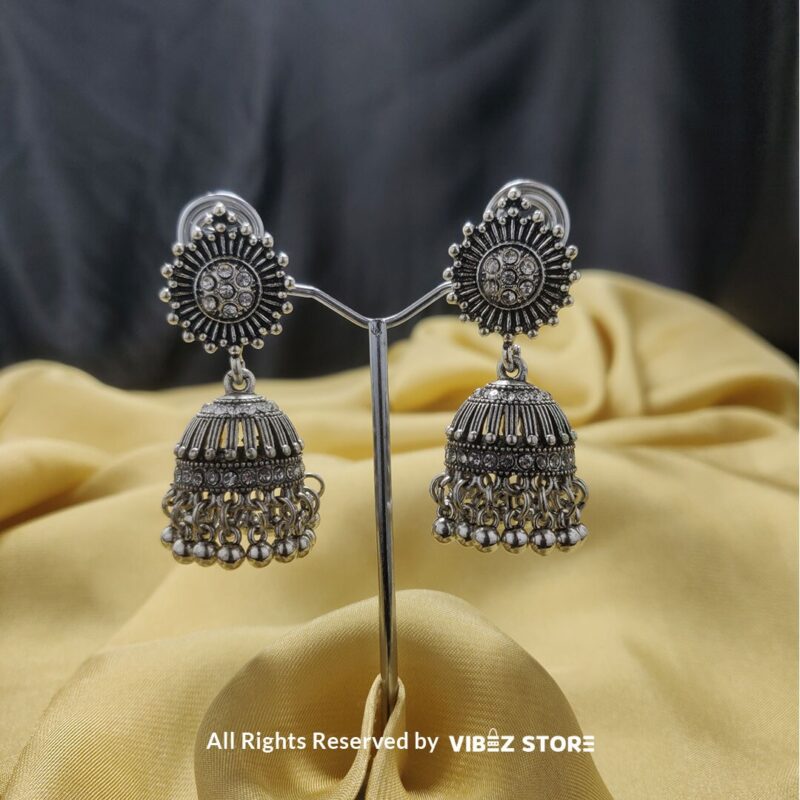 Oxidized Silver Sunburst Jhumka Earrings with intricate sunburst design and classic bell-shaped dangle from VibezStore