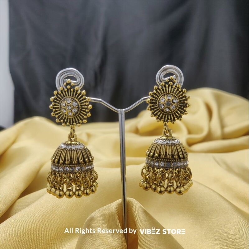 Oxidized Silver Sunburst Jhumka Earrings with intricate sunburst design and classic bell-shaped dangle from VibezStore