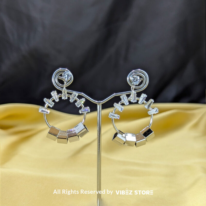 Geometric hoop earrings with crystals, shown in silver and gold-tone variations by Vibez Store.