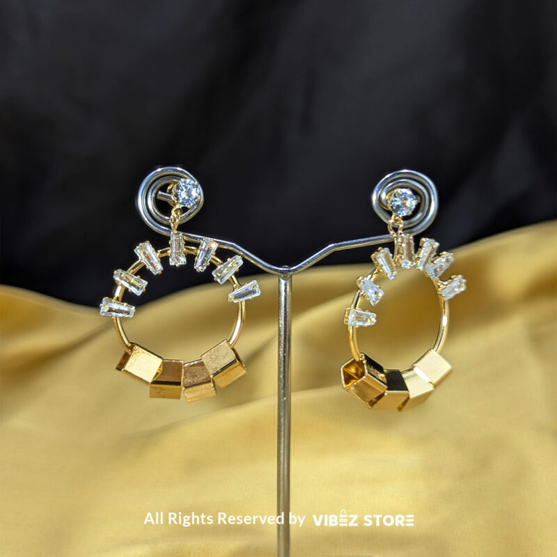 Geometric hoop earrings with crystals, shown in silver and gold-tone variations by Vibez Store.