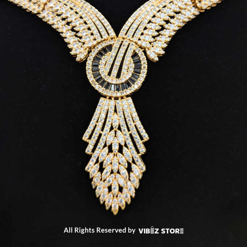 Crystal wings jewelry set featuring a necklace, earrings, bracelet, and ring, elegantly displayed by Vibez Store.