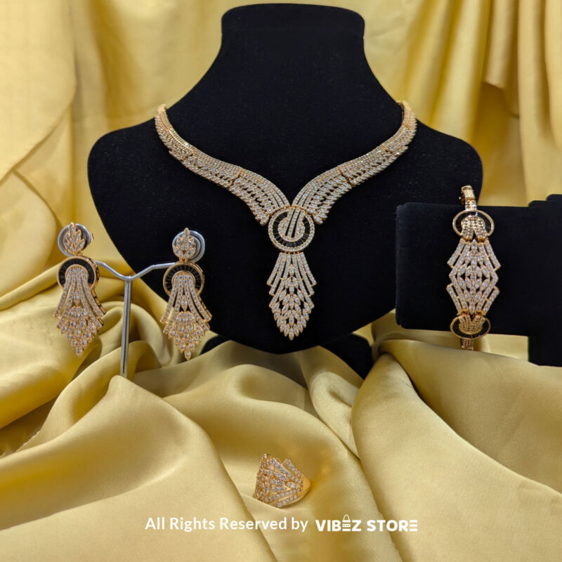 Crystal wings jewelry set featuring a necklace, earrings, bracelet, and ring, elegantly displayed by Vibez Store.