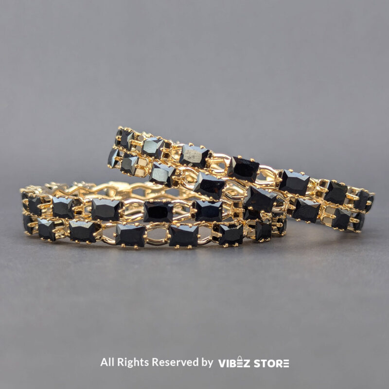 Black stone bangle with gold grid design, displayed elegantly by Vibez Store.