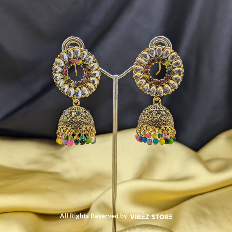 Kundan polki jhumka earrings with multicolor beads and intricate gold-tone detailing.