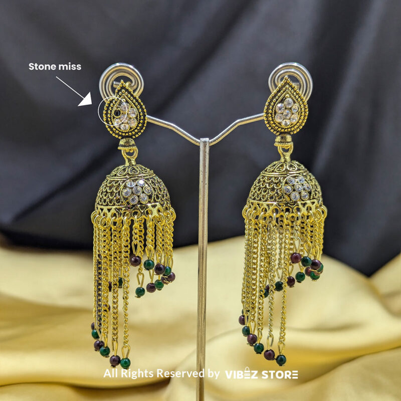 Golden chain tassel jhumka earrings with vibrant bead accents and intricate studded detailing.