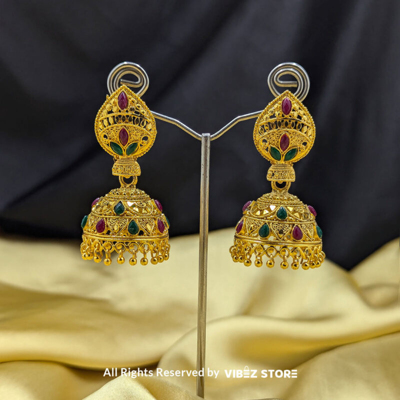 Golden jhumka earrings with intricate detailing and multicolor stone accents, perfect for ethnic and festive wear.