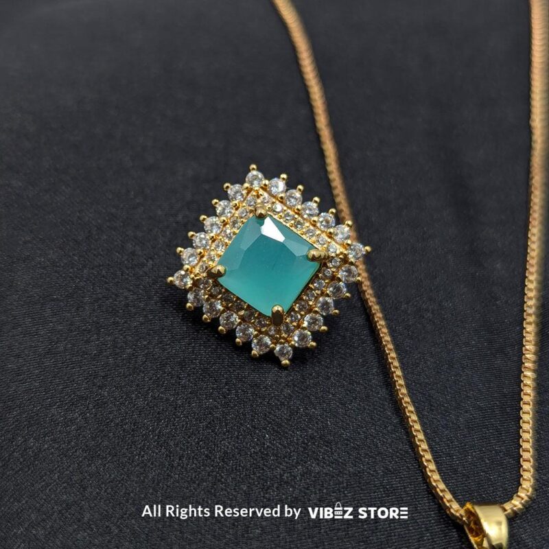 Aqua blue square pendant jewelry set featuring a soft blue gemstone necklace with matching stud earrings, surrounded by sparkling stones.