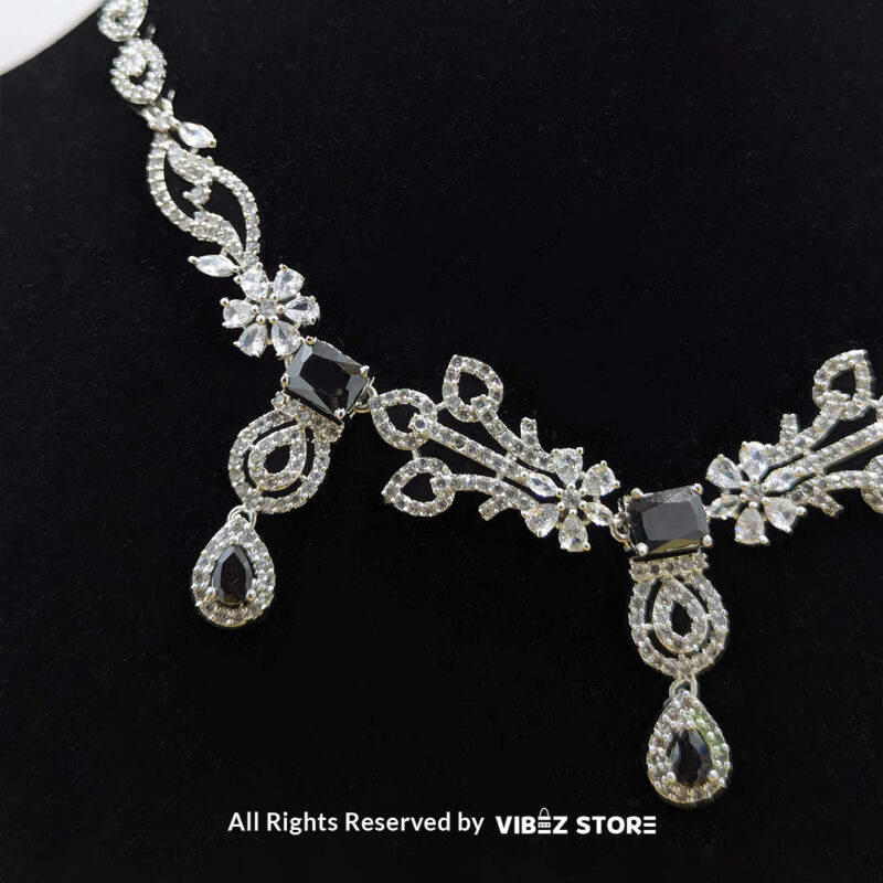 Elegant Crystal Bridal Necklace Set with silver-tone settings, matching earrings, and maang tikka from VibezStore