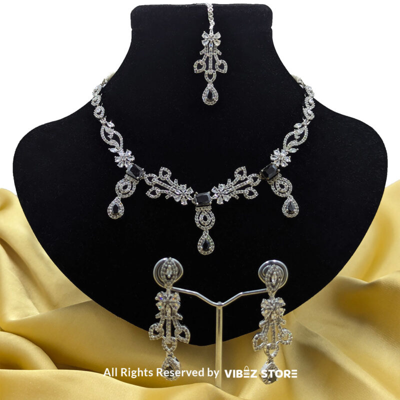 Elegant Crystal Bridal Necklace Set with silver-tone settings, matching earrings, and maang tikka from VibezStore