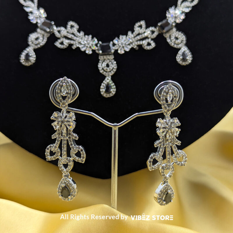 Elegant Crystal Bridal Necklace Set with silver-tone settings, matching earrings, and maang tikka from VibezStore