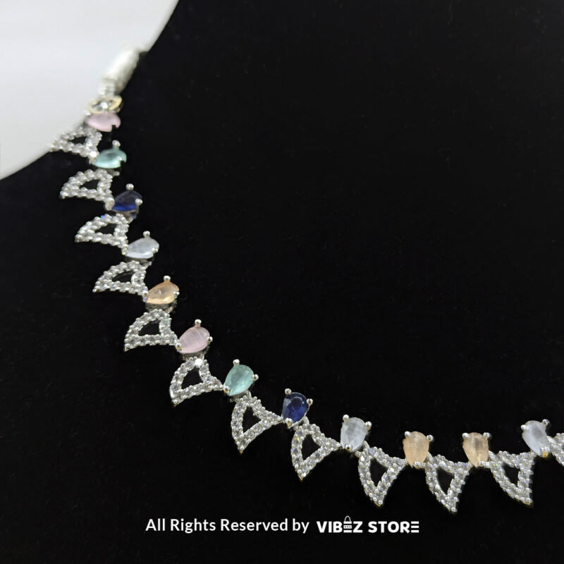 Pastel Gemstone Necklace and Earring Set with silver-tone settings, multi-colored gemstones, and crystal accents from VibezStore