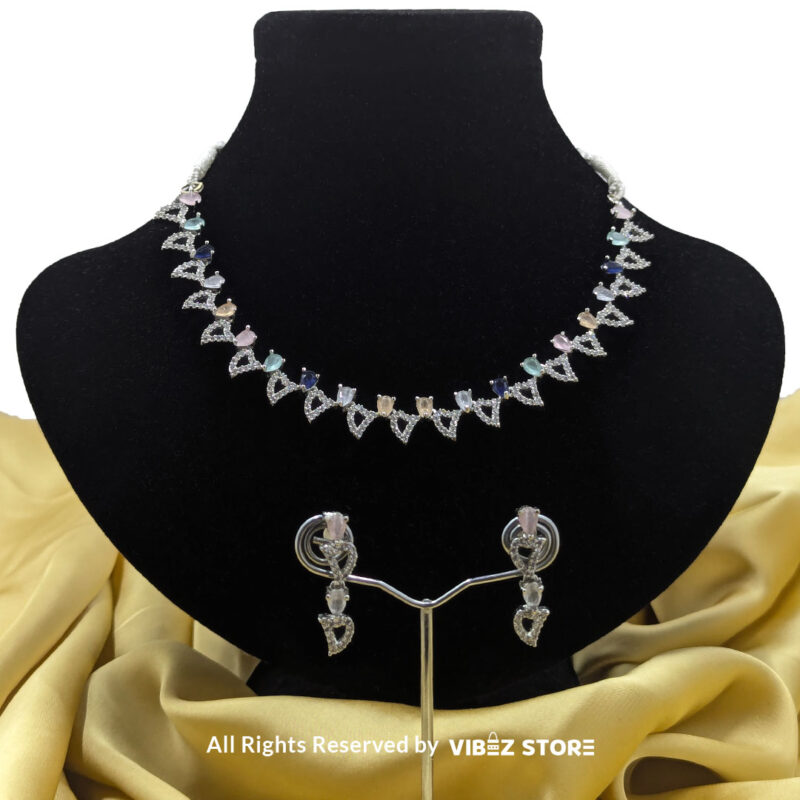 Pastel Gemstone Necklace and Earring Set with silver-tone settings, multi-colored gemstones, and crystal accents from VibezStore