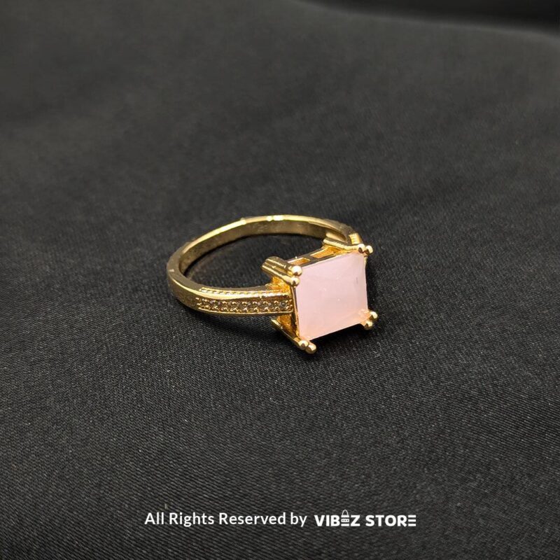 Gold-tone non-adjustable rings with square gemstones in multiple colors, including rose pink, aqua blue, emerald green, ruby red, black, crystal white, and amber gold, beautifully displayed by Vibez Store.