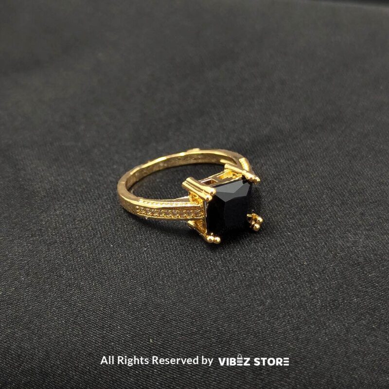 Gold-tone non-adjustable rings with square gemstones in multiple colors, including rose pink, aqua blue, emerald green, ruby red, black, crystal white, and amber gold, beautifully displayed by Vibez Store.