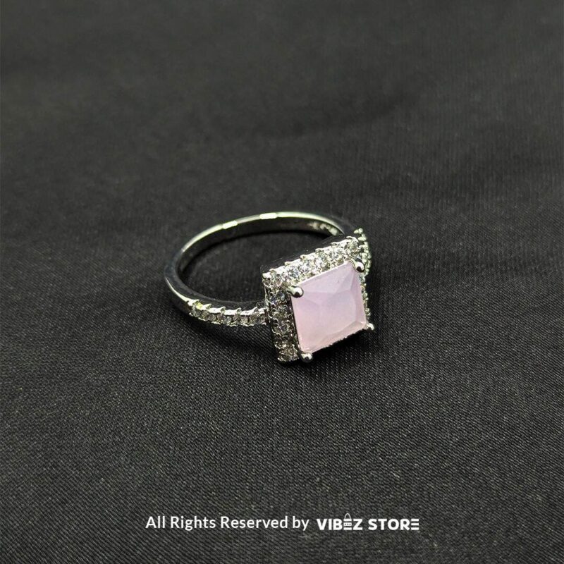 Silver-tone adjustable rings with square gemstones in aqua blue, rose pink, and emerald green, elegantly displayed by Vibez Store.